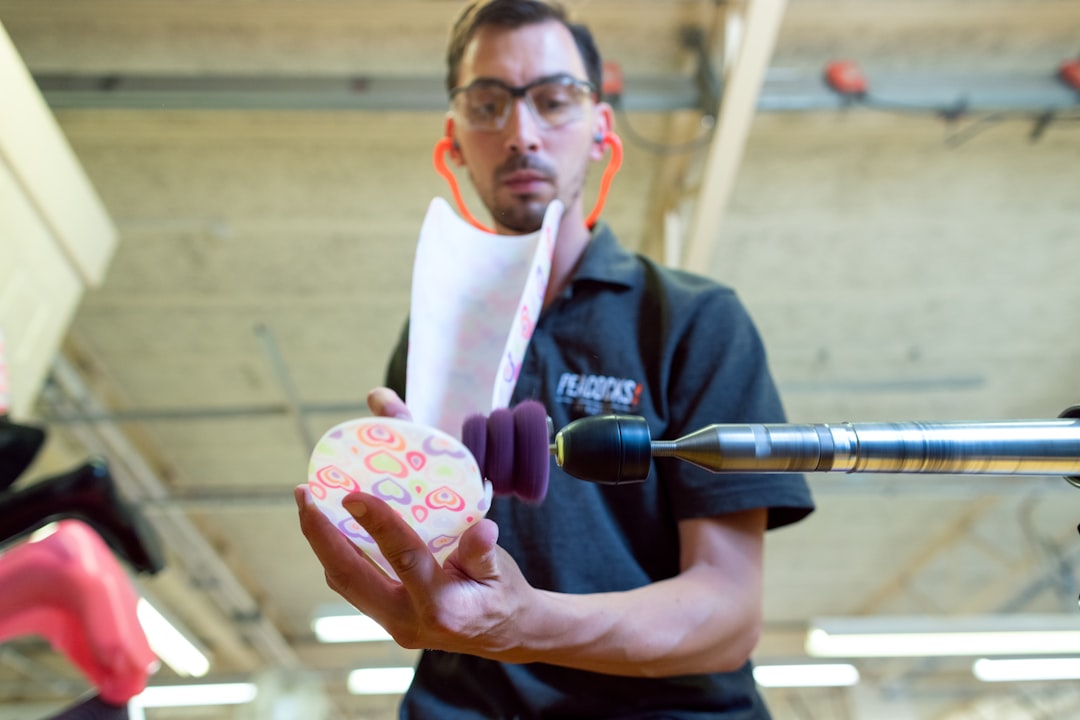 Male orthotic technician engineer makes personalised leg splint